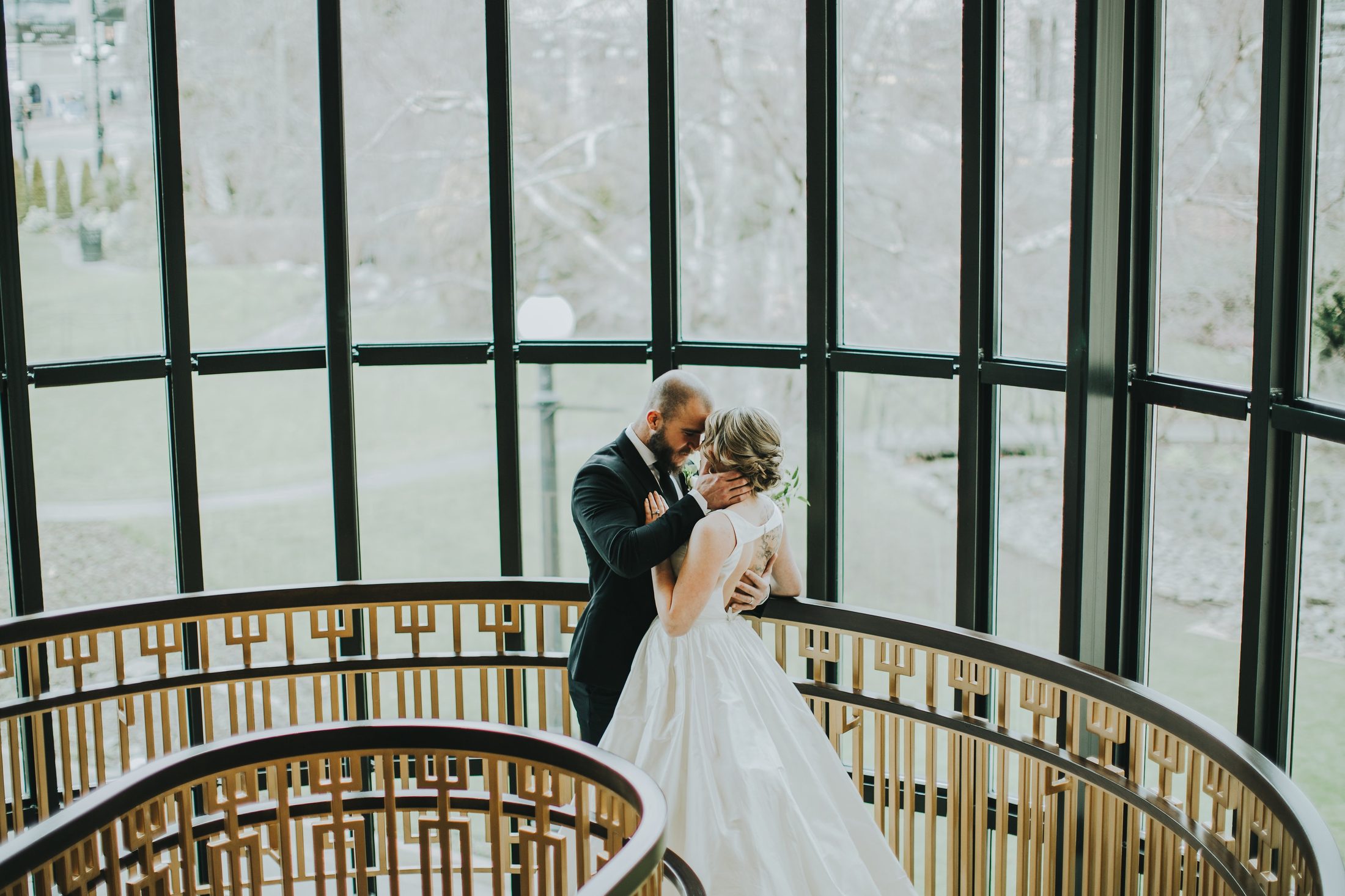 The Fairmont Empress, dressed as an enchanted garden — an arched window framing the garden view.